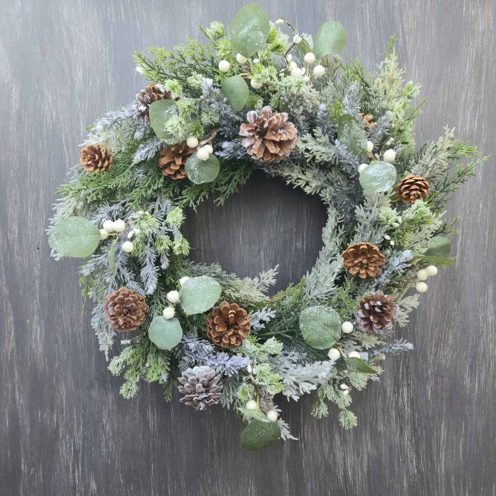 Handmade lush, artificial Winter Greenery Wreath With White And Brown Accents